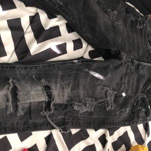 H&M black skinny with rips